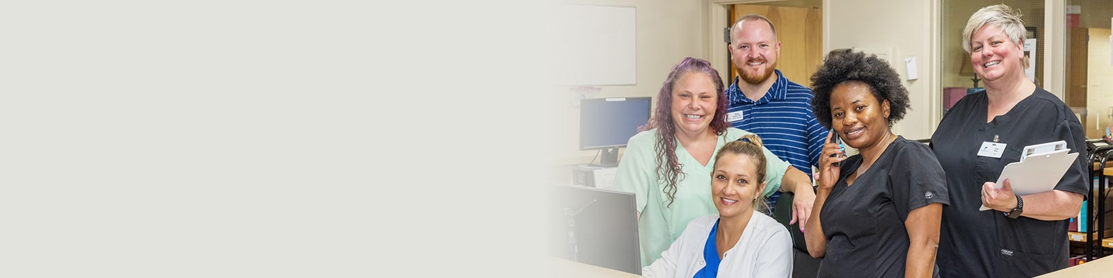 A group of nurses at the Nurse's station at the Piedmont Post Acute facility